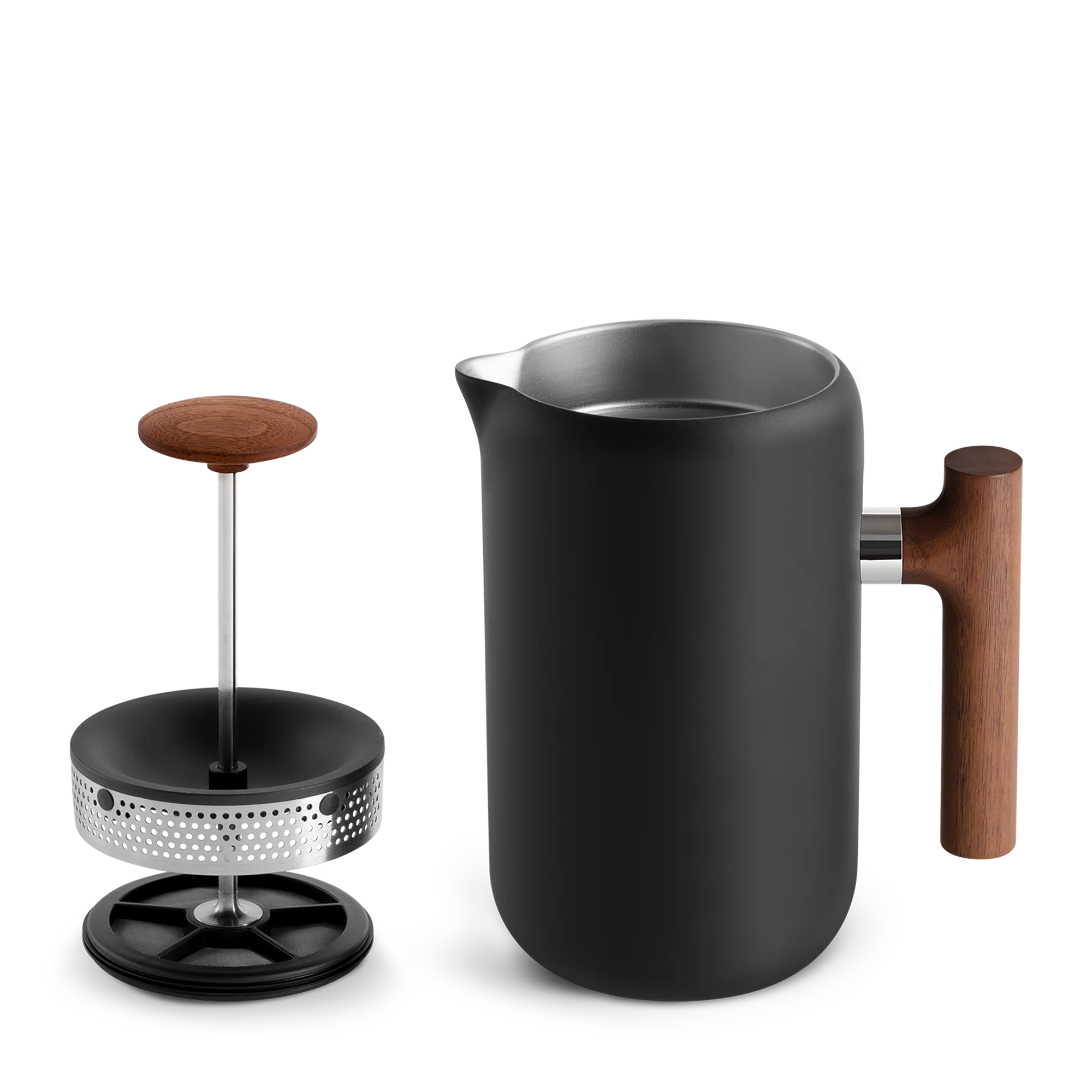 Fellow Clara French Press, Valnød, fra Fellow har et slankt matsort design med et træhåndtag. Den har vakuumisolerede vægge og en nonstick-underside for perfekt brygning. Låget og stemplet med deres træknopper afslører dets indre af rustfrit stål.