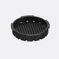 En rund, sort AeroPress-filterholder reservedel by Aeropress i plast med perforeret bund og rillede sider, perfekt som kaffefiltre Aeropress tilbehør, er vist mod en almindelig lysegrå baggrund.