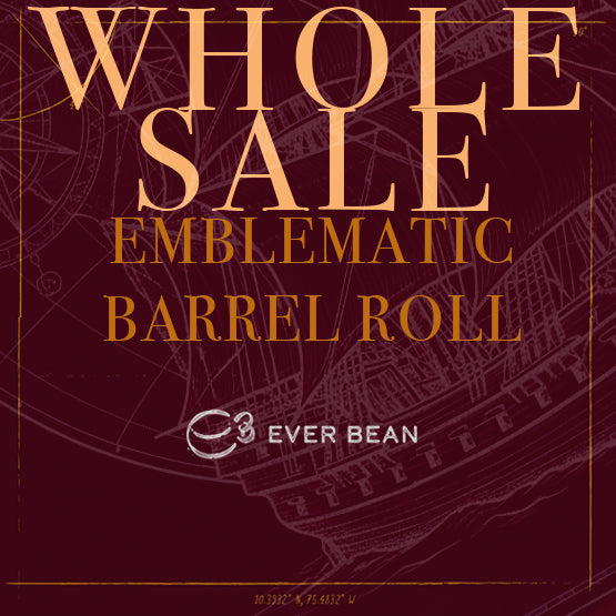 Rødbrun baggrund med tekniske stregtegninger. Overlejret tekst: "LIMITED, EMBLEMATIC BARREL ROLL (W)." Nedenfor er det hvide EverBean Wholesale-logo, koordinater og en note om eksklusiv kaffe fra Colombianske kaffebønner i bunden.