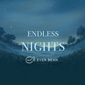En mørkeblå nattehimmel med stjerner og træer i silhuet centrerer ordene "ENDLESS NIGHT". EverBean-logoet og -navnet nedenfor fremkalder den dristige smag af Endless Night - Espresso Blend.
