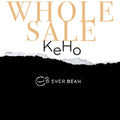 Teksten lyder "EverBean Wholesale KeHo (w)" med store bogstaver over logoet og på en sort-hvid, afrevet papirbaggrund - ideel til at fremhæve hele kaffebønner eller Kenya Honduras kaffe.